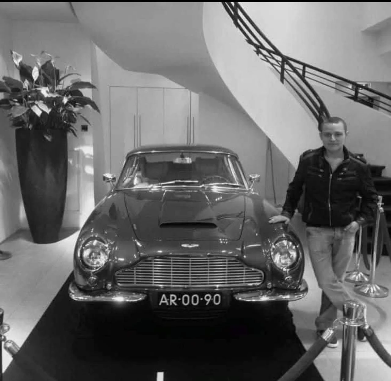 Delano with an Aston Martin DB6 (Private photo).