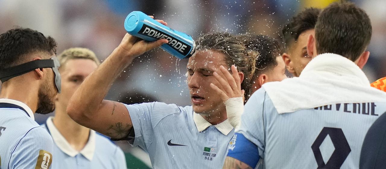 Agustin Canobbio from Uruguay takes a drink break 