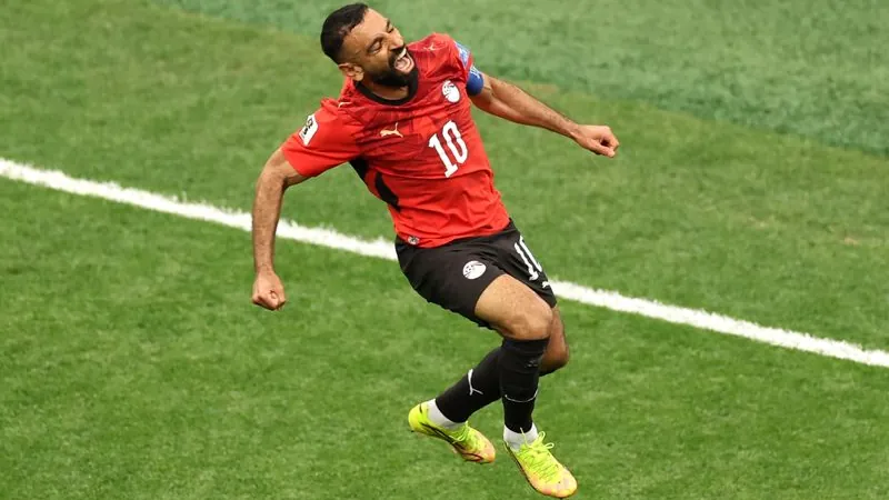 Egypt's Mohamed Salah (10) celebrates after scoring his team's second goal in the World Cup group game.