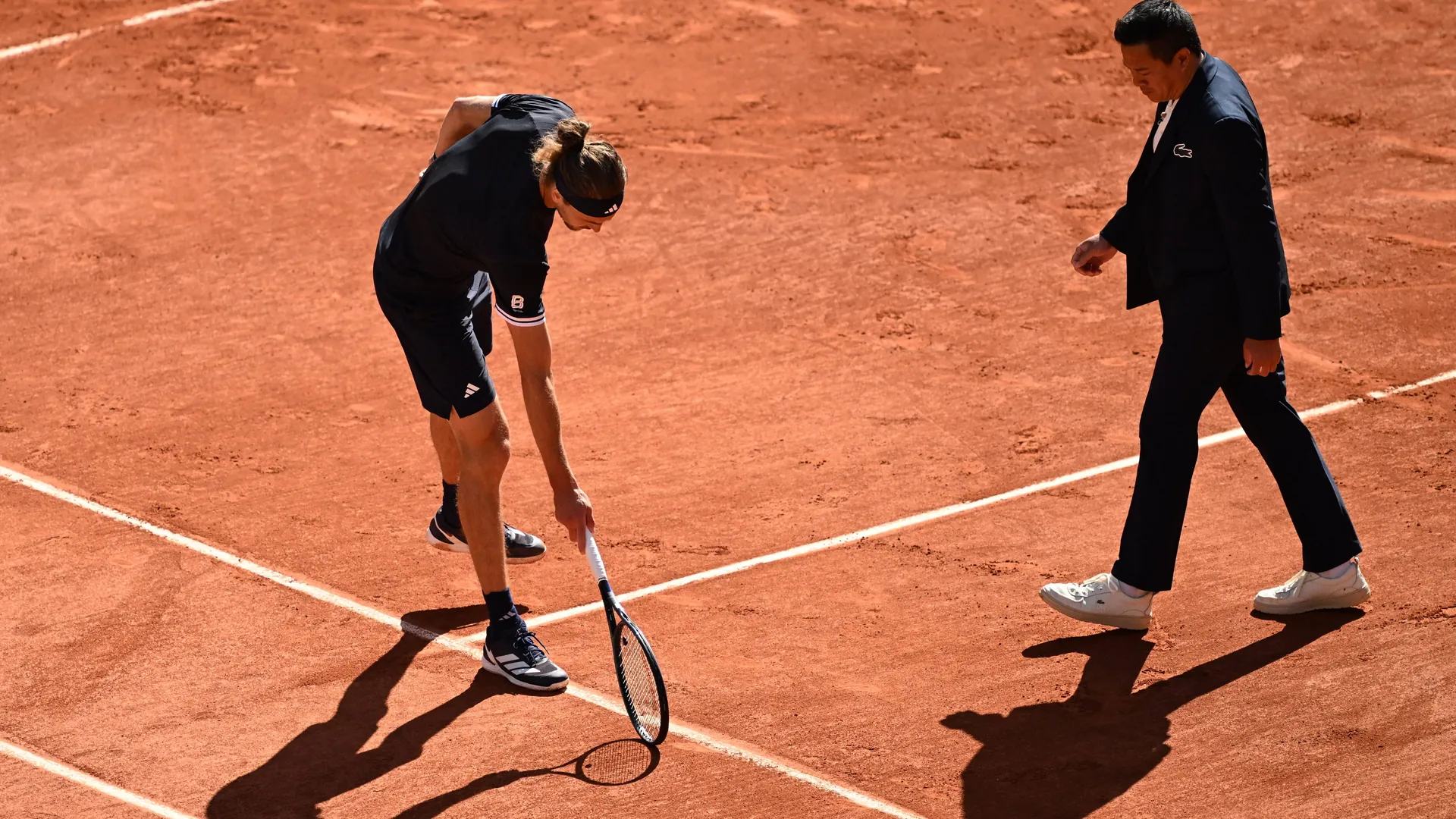 Point of contention: Alexander Zverev (left) and chair referee James Keothavong.