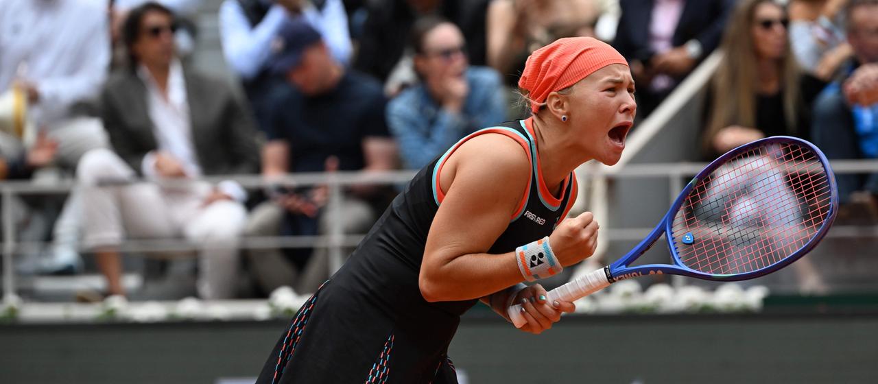 Diana Shnaider cheers in the game against Aryna Sabalenka