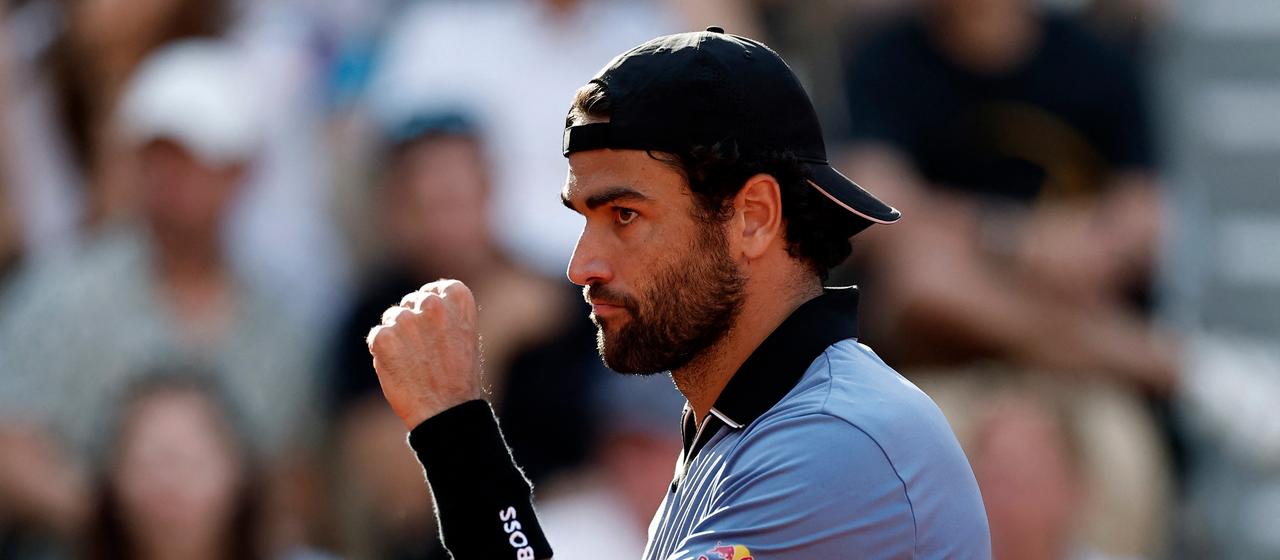 Italy's Matteo Berrettini celebrates his point win
