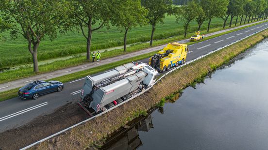 Garbage truck goes off the road near Dieverbrug