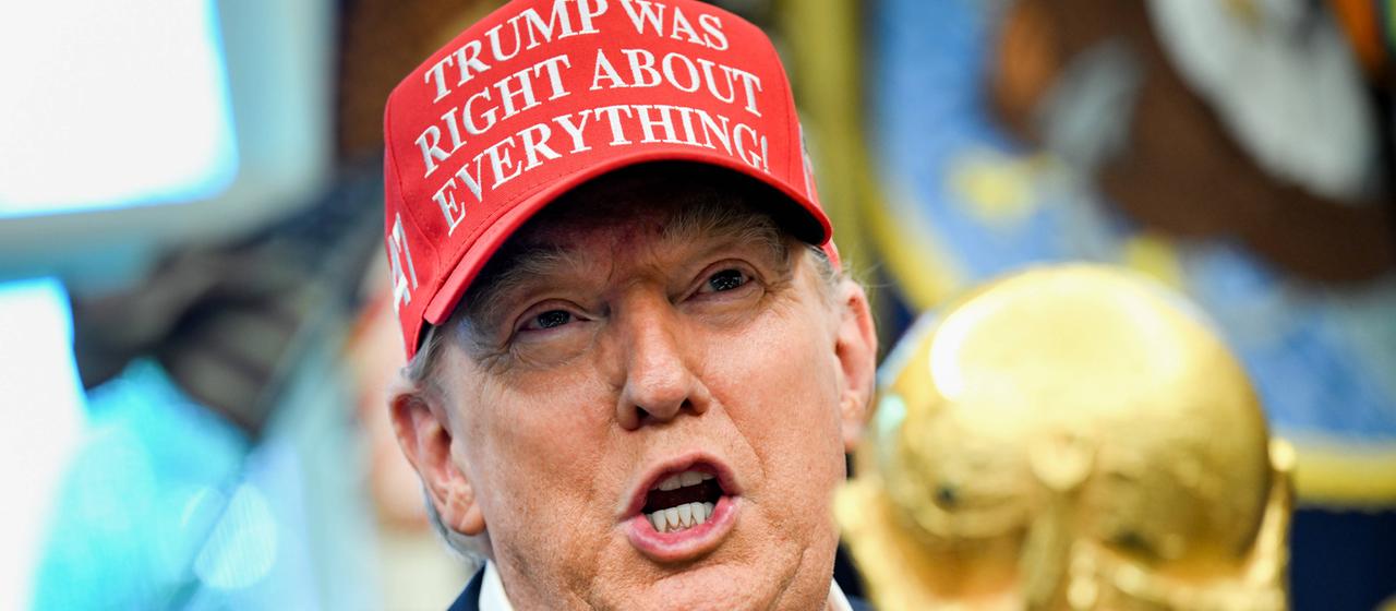 Donald Trump with World Cup trophy