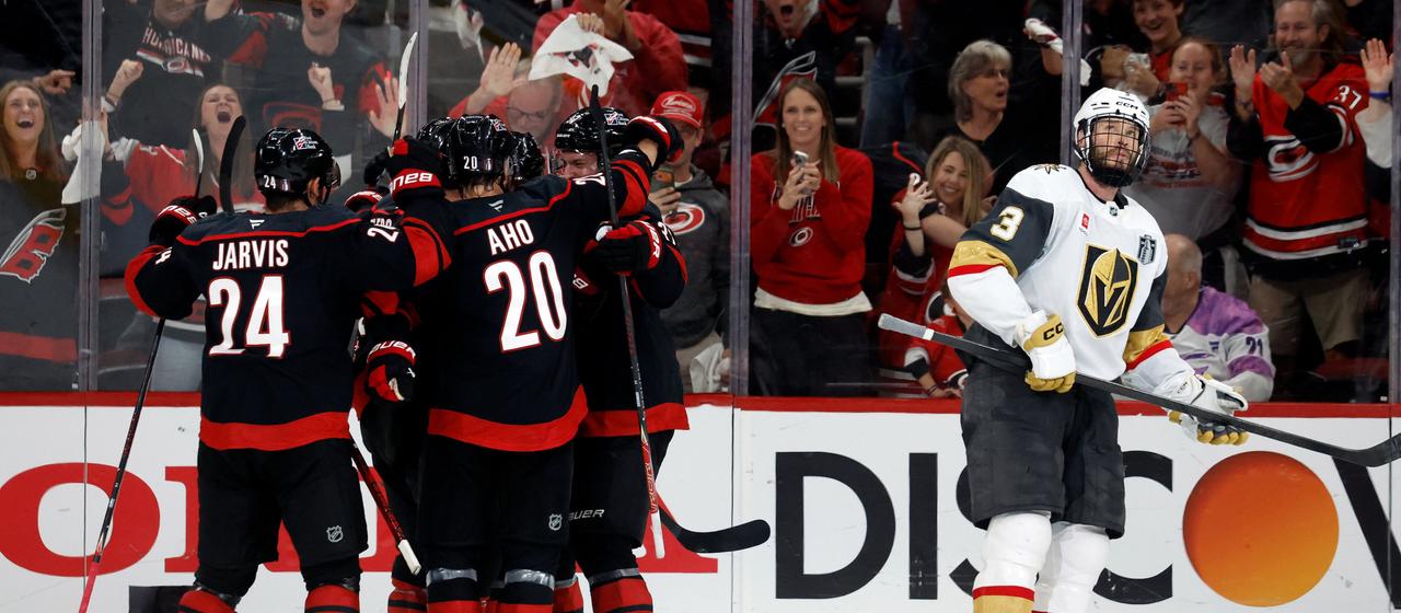 The Carolina Hurricanes celebrate the victory