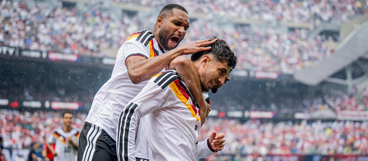 Cheers from Jonathan Tah and Kai Havertz