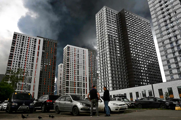 There are black roofs in two beautiful apartment buildings in Moskou 