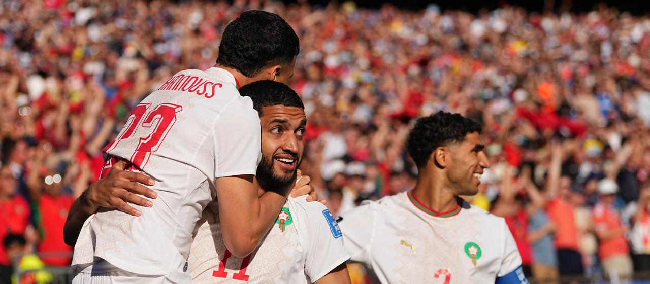 Ismael Saibari celebrates with Bilal El Khannouss about the opening goal against Scotland