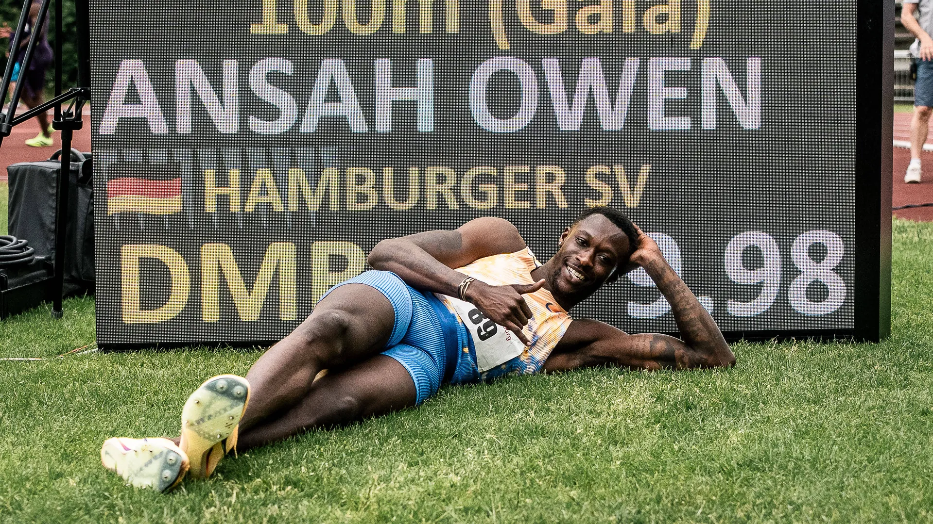 Owen Ansah poses in front of the scoreboard: He is still chasing records. Owen Ansah poses in front of the scoreboard: He is still chasing records.