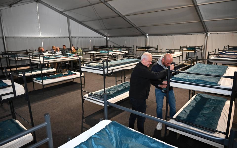 Temporary emergency shelter for asylum seekers in the De Slenken sports hall in De Wijk
