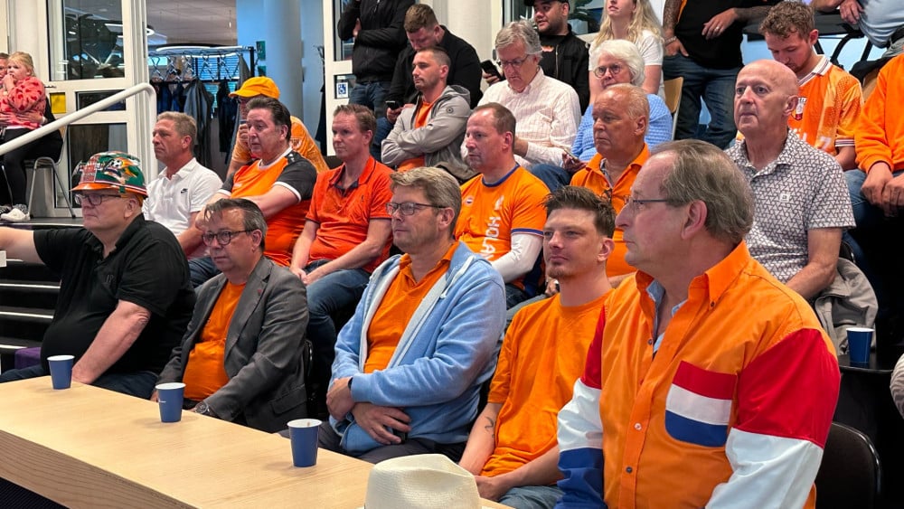 The Huizen council chamber turns orange in the hope that the pub will be allowed to close later during the World Cup