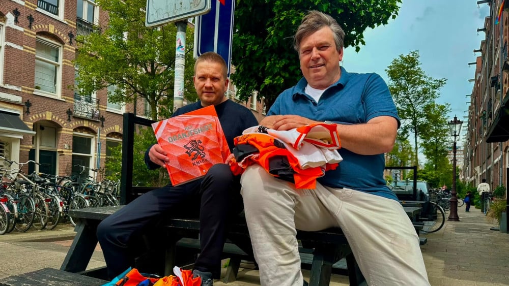 These men have a huge collection of Orange shirts, and now there is also a book