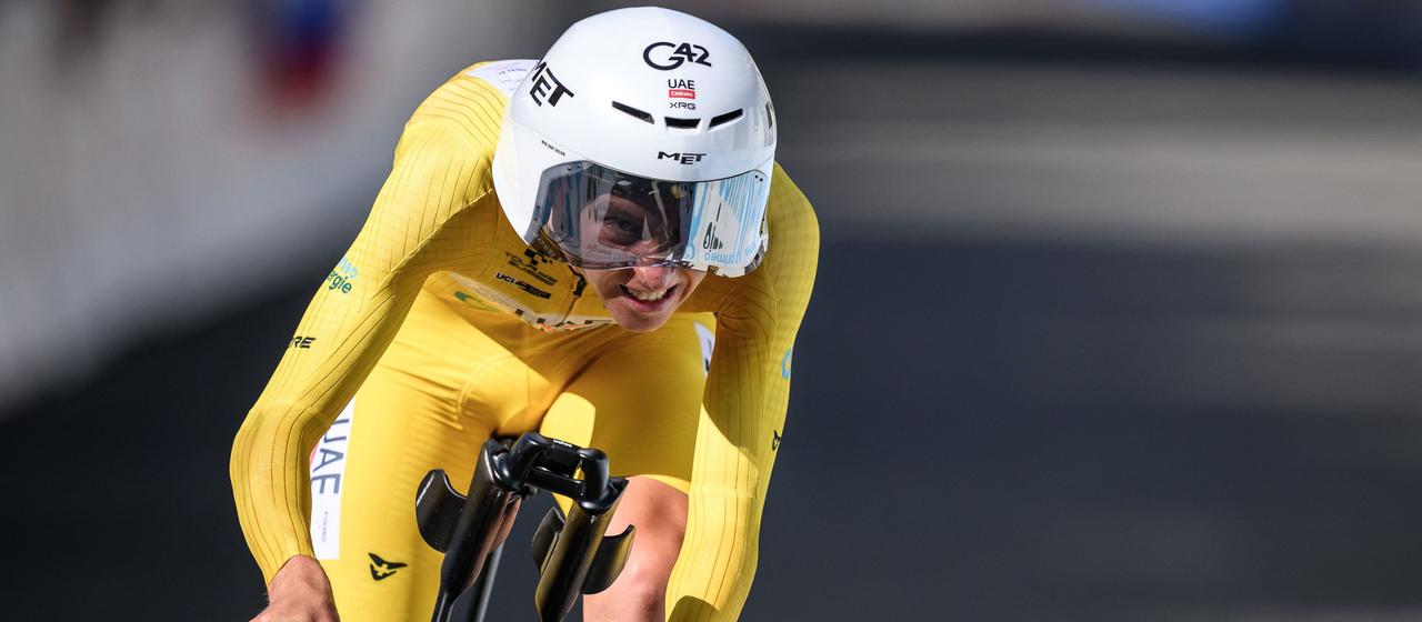 Professional cyclist Tadej Pogacar in the yellow jersey of the Tour de Suisse 2026