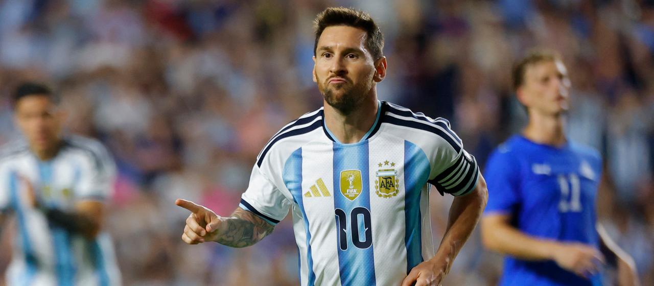 Lionel Messi celebrates his goal in the friendly against Iceland