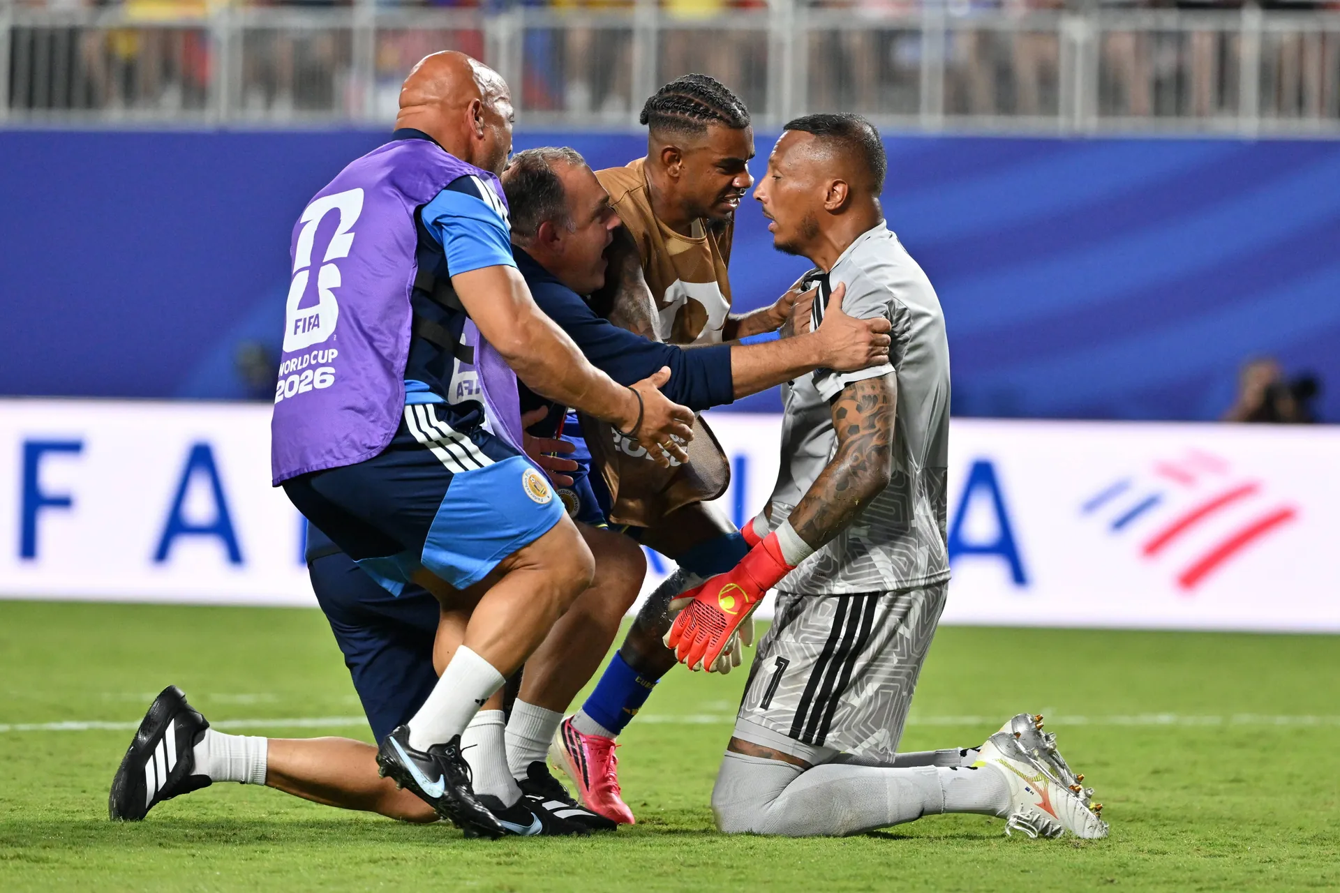 Eloy Room (r.) is celebrated by his teammates after the final whistle. Eloy Room (r.) is celebrated by his teammates after the final whistle.