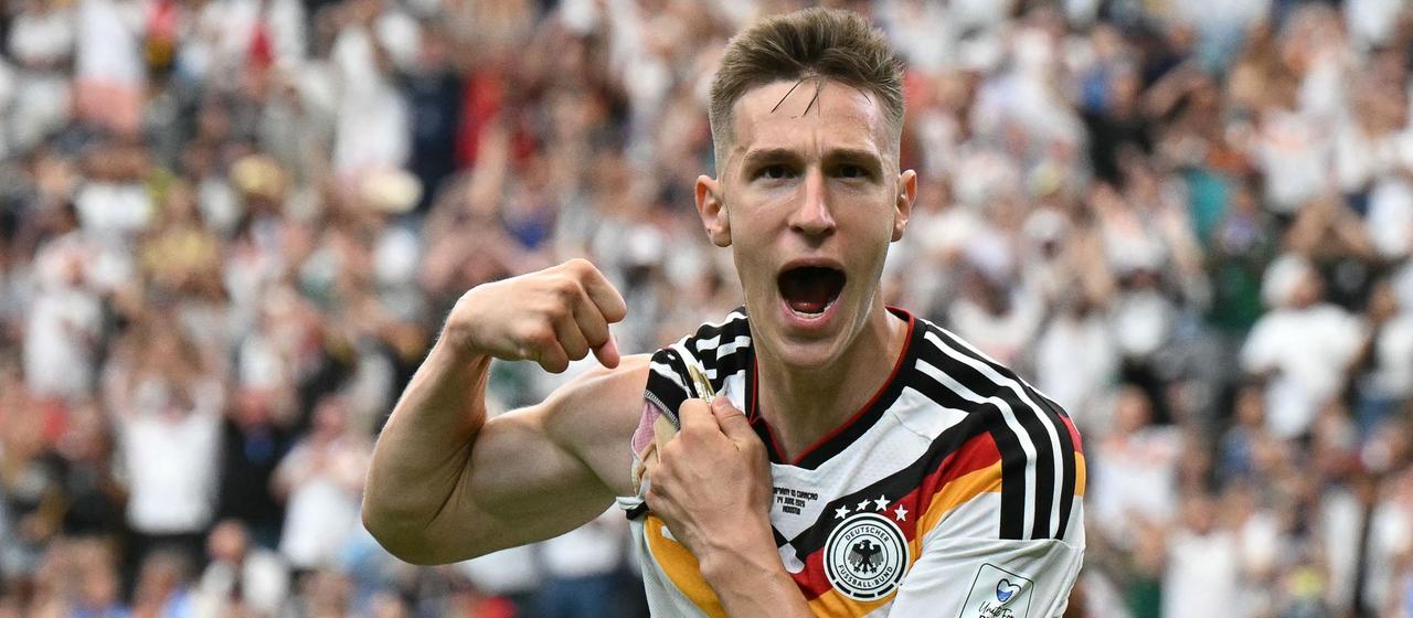 Nico Schlotterbeck celebrates his goal to make it 2-1 against Curacao
