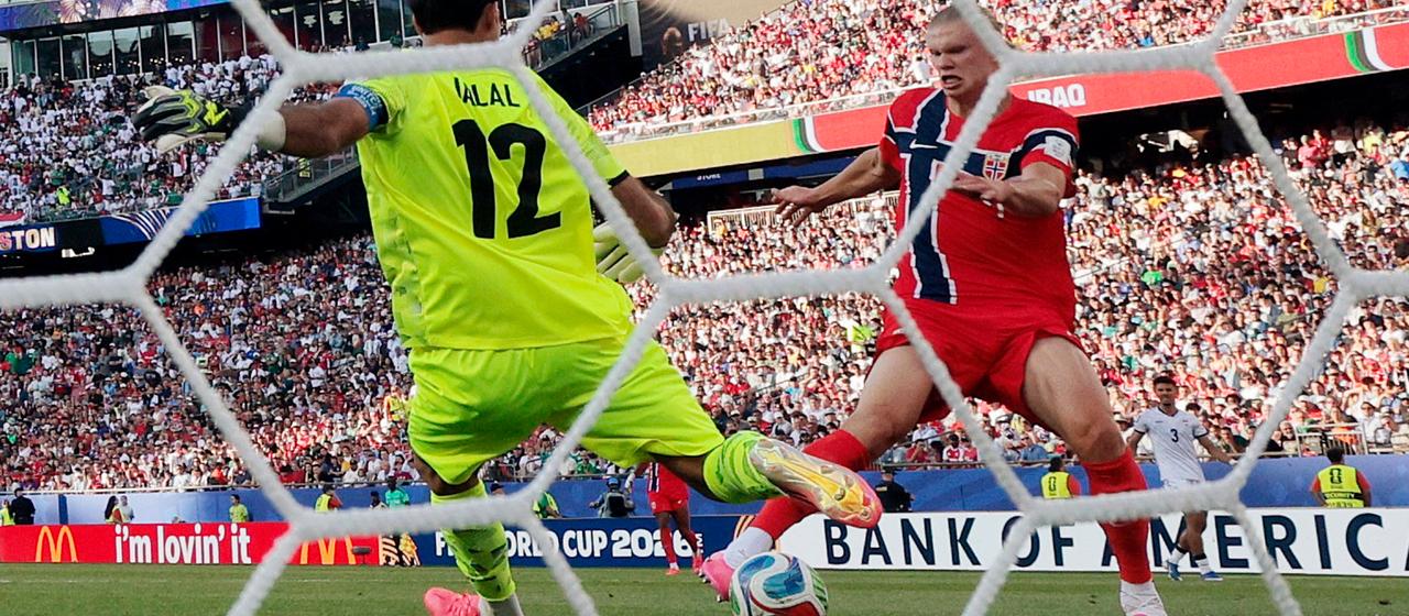 Norway's Erling Haaland takes advantage of Jalal Hassan's mistake to make it 2-1
