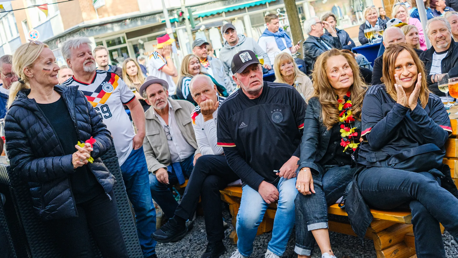 A group of people at the public viewing of a Germany game in Duisburg. A group of people at the public viewing of a Germany game in Duisburg.
