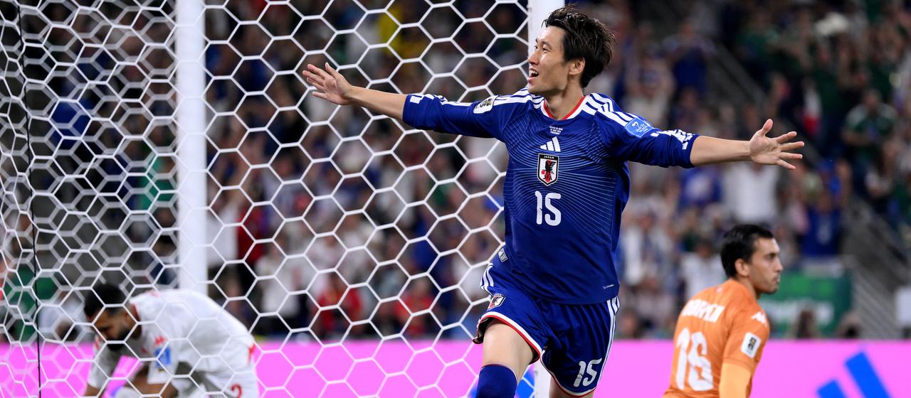 Daichi Kamada celebrates the opening goal