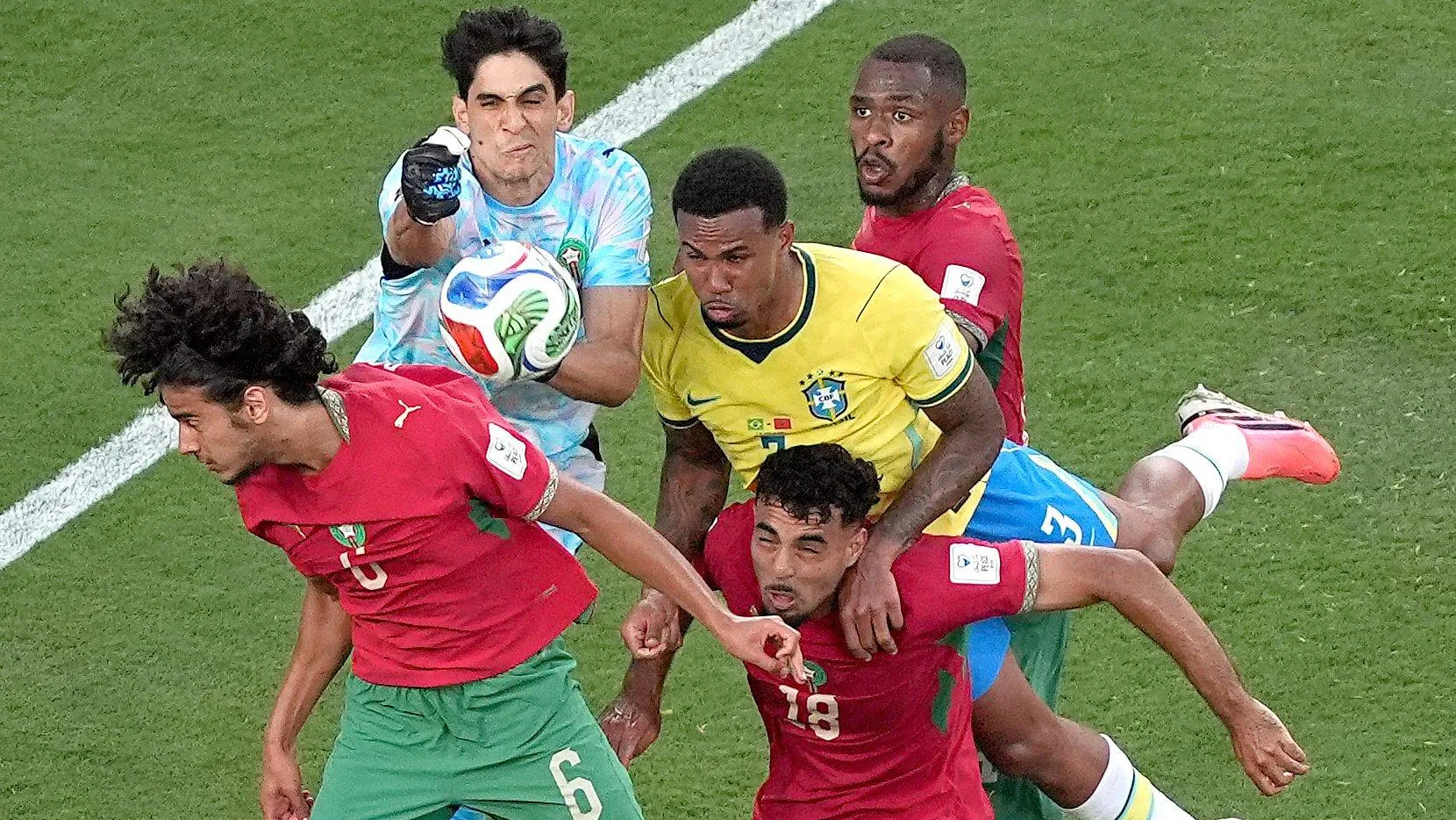 No way through: Brazil's Gabriel (M.) misses the chance to head the ball against Morocco's defense around goalkeeper Bono. No way through: Brazil's Gabriel (M.) misses the chance to head the ball against Morocco's defense around goalkeeper Bono.