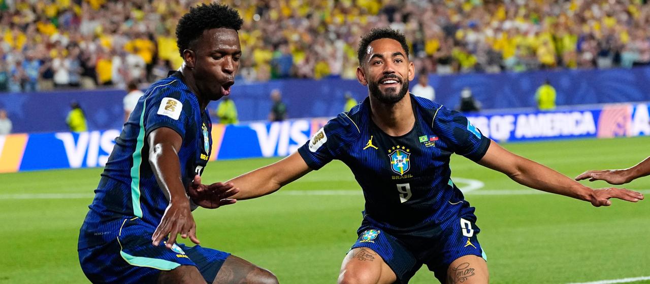 Vini Jr. and Matheus Cunha cheer together