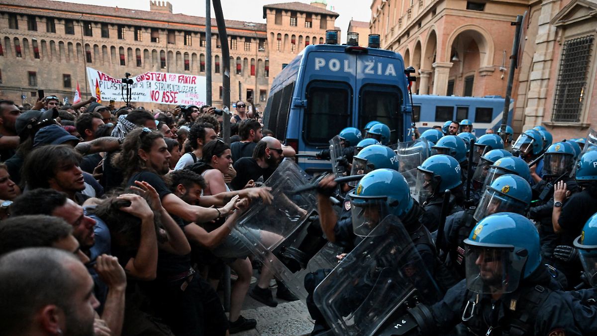 11 Injured in Bologna: Furious Riots Erupt After Fatal Police Arrest