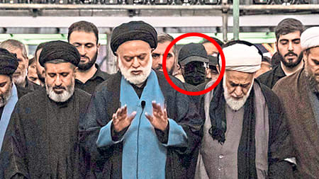 Iran: Masked Man Fuels Speculation About Disfigured Chamenei’s Presence