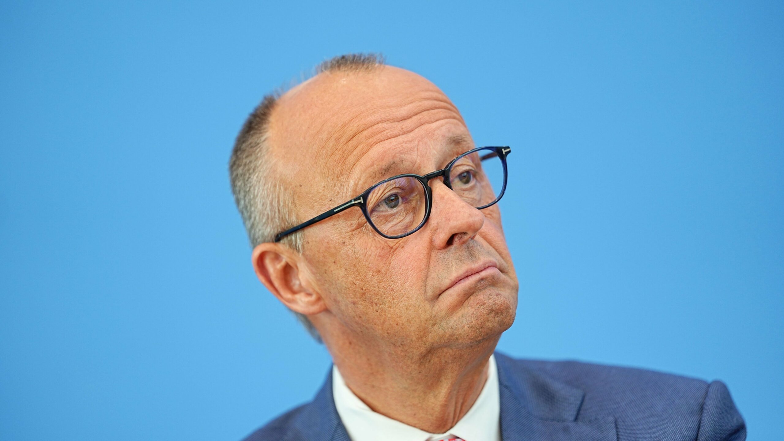 Merz Criticizes Unicredit’s Aggressive Tactics on Commerzbank: Insights Ahead