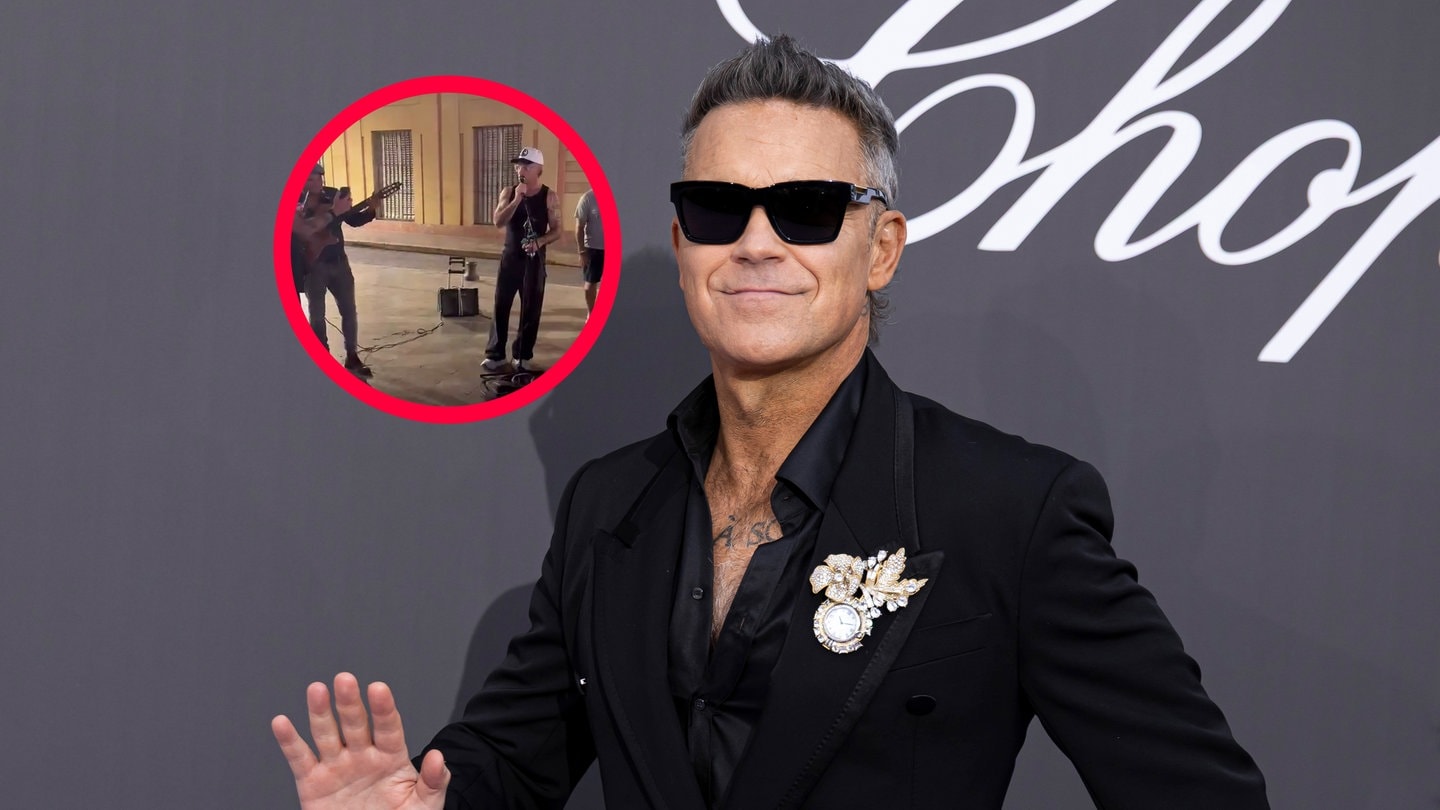 Robbie Williams Sings “Angels” with Street Musician in Sevilla!